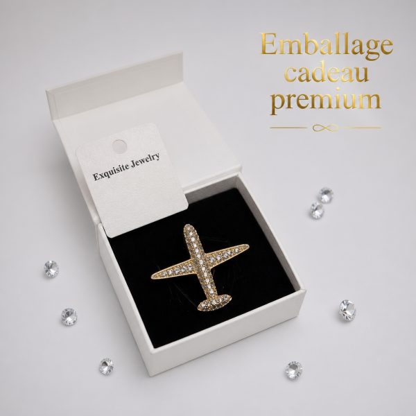 Broche déco avion avec strass imitation diamant finition dorée élégante